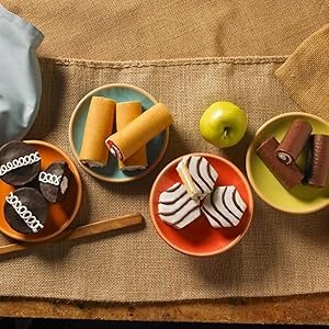 Little Debbie variety of cakes on plates